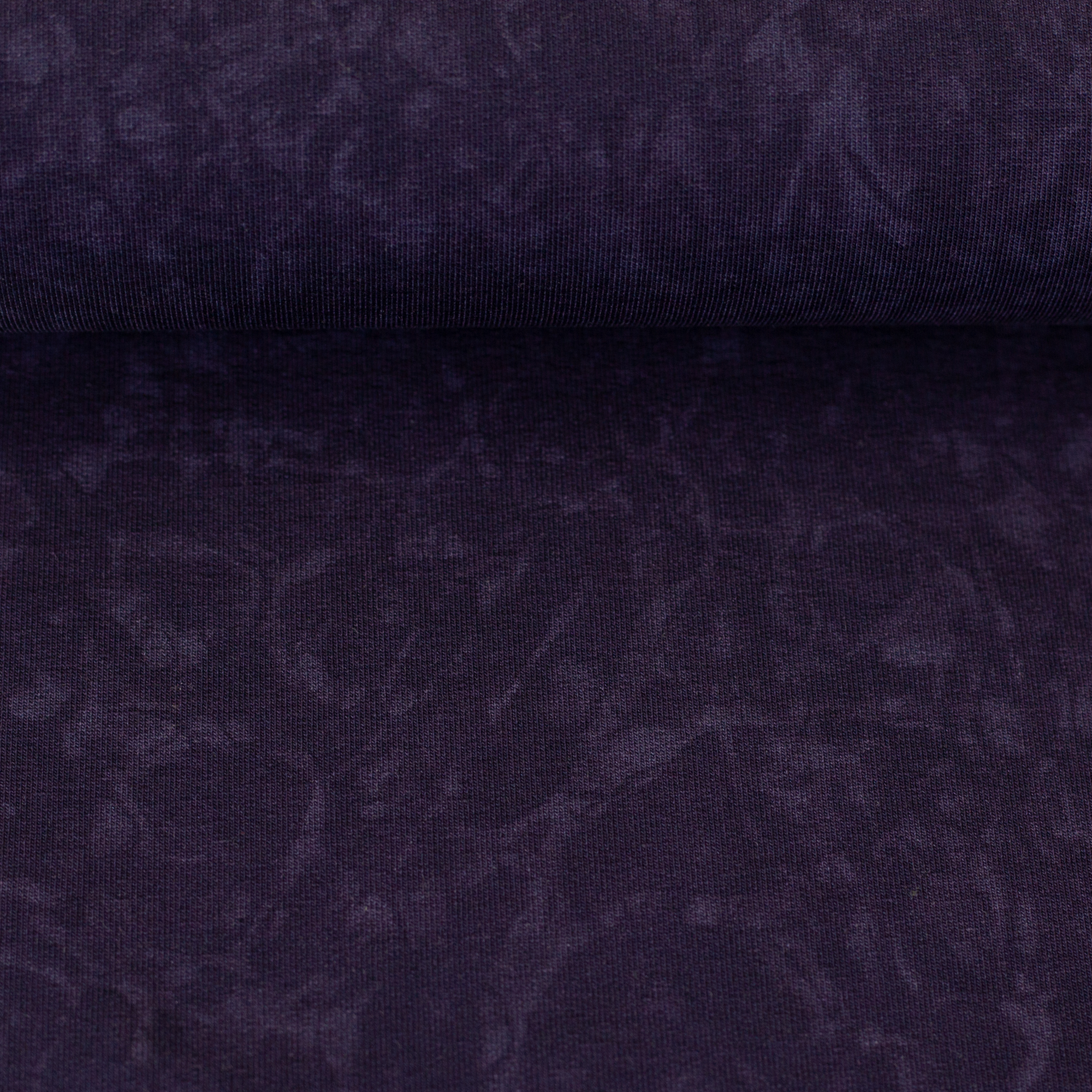 Unicornique von Thorsten Berger in violett, auf dem Stoffballen