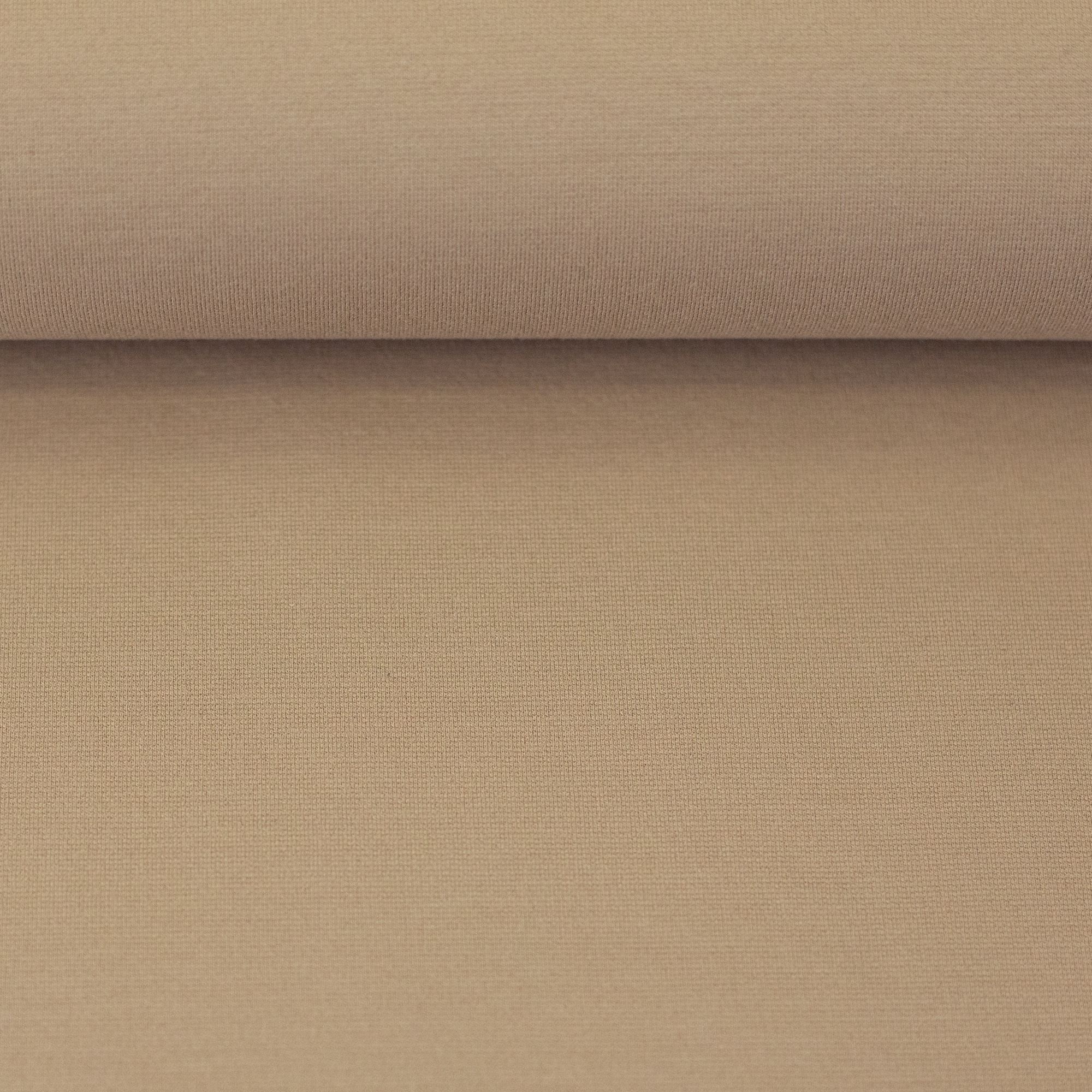 Modena – Romanitjersey in beige, auf dem Stoffballen