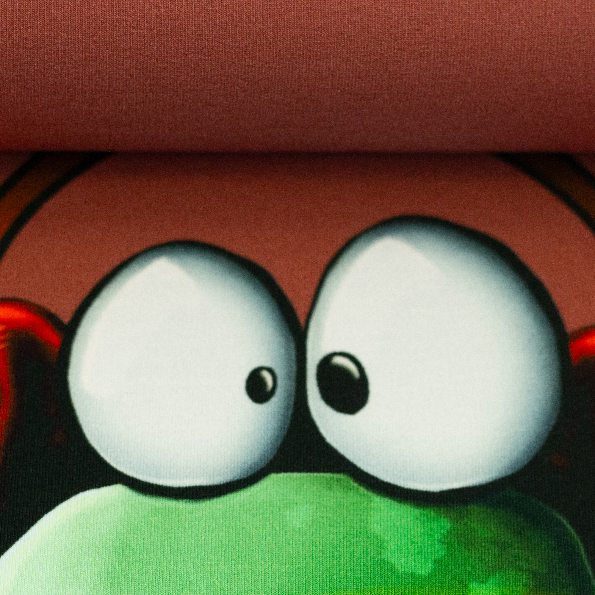 Stopcroaking by Thorsten Berger in orange, on the fabric bolt